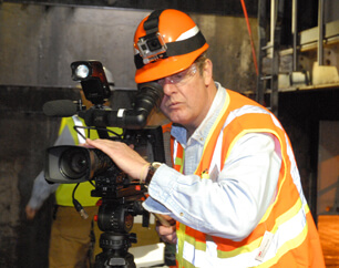 James with video camera for site inspection